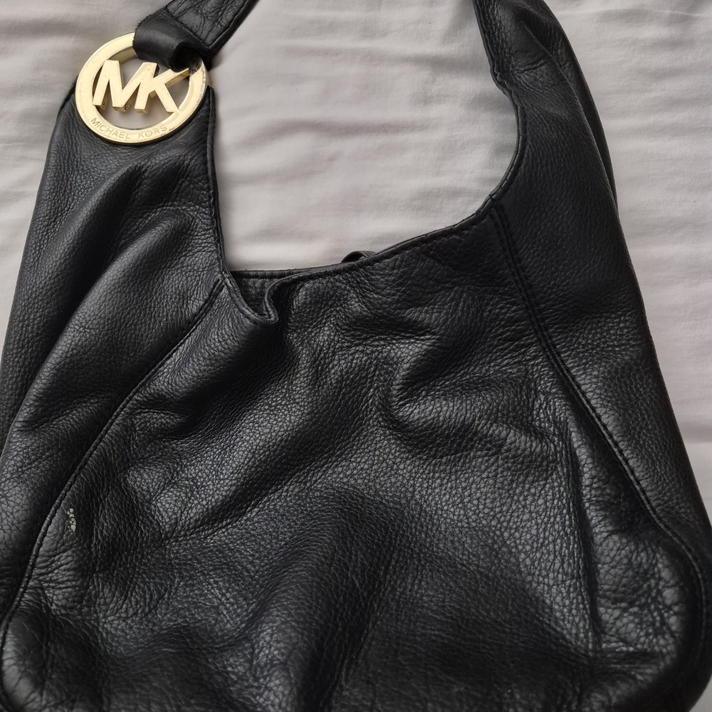 Michael Kors Black Hobo Bag with Gold Accent